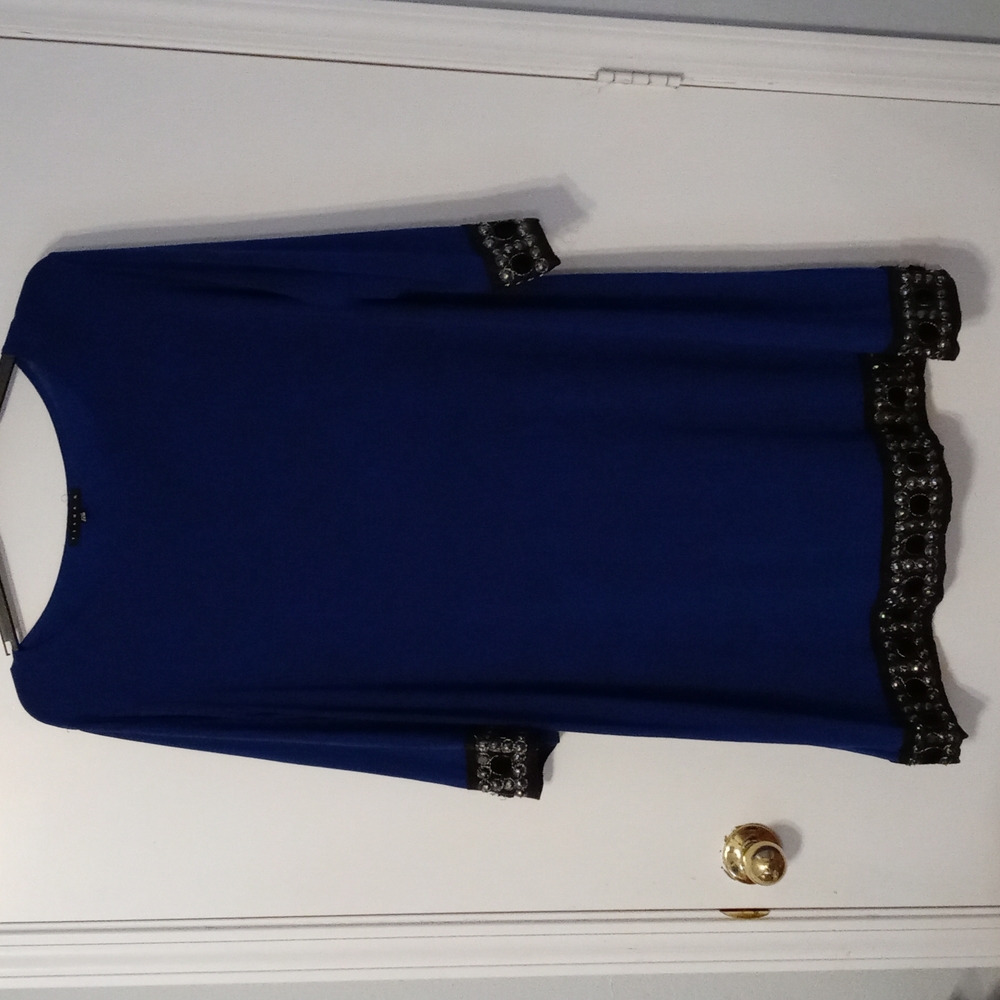 Blue dress with black Cuffs andhem was beading